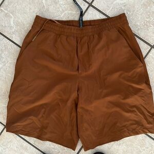 Lululemon copper colored lined men’s shorts